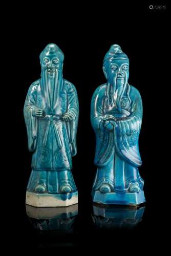 A pair of model of turquoise-glazed Immortals China, 20th century(h. 29 cm.)ITCoppia di Immortali in