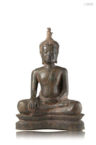 A bronze Buddha with traces of gilt (slight defects)China, Ming dynasty (1368-1644)(h. 26.5 cm.)