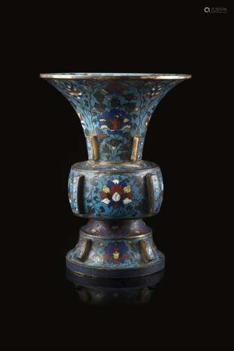 A cloisonnè enamel vase of archaistic shape, zun, decorated with colourful floral motifs against a