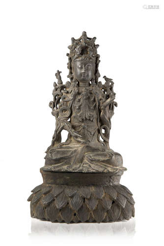 A bronze model of Guanyin on a lotus base (defects and restorations)China, Ming dynasty (1368-