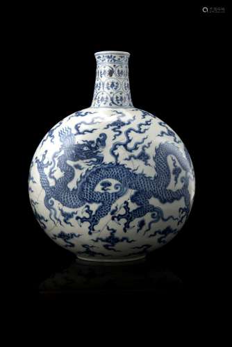 A blue and white moonflak, each side decorated with a three/clawed dragon amongst clouds (defects