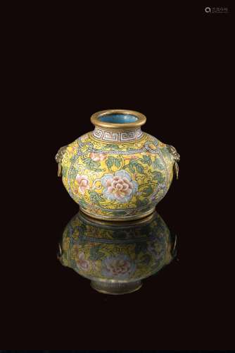 A small vase with twin lion-head handles suspending rings, decorated in Beijing enamels with
