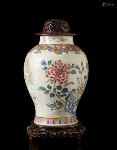 A porcelain vase, wood base and cover (defects and restorations)China, Qing dynasty, Yongzheng