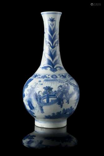 A blue and white bottle vase decorated in various tones of blue, the globular body with an