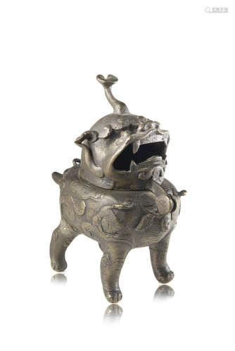 A bronze censer and cover shaped as a qilinChina, Ming dynasty (1368-1644)(h. 16.5 cm.)