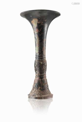 An archaistic gu bronze vase with a high relief decoration (defects)China, 19th century(h. 24.5