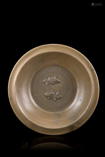 A celadon glazed dish, with a central decoration of twin fishChina, Ming dynasty (1368-1644)(d. 30