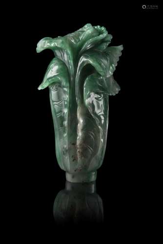 A green and apple-green jadeite carving depicting a 
