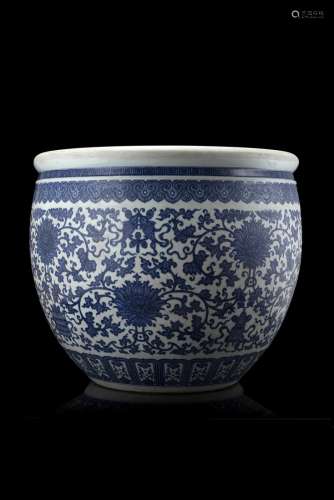 A large blue and white jardiniere decorated with the Eight Buddhist Emblems bajixiang and with