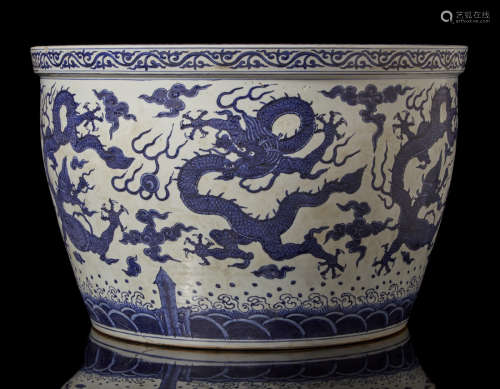 A large blue and white fish bowl decorated with dragons, with apocryphal Jiajing mark (defects)