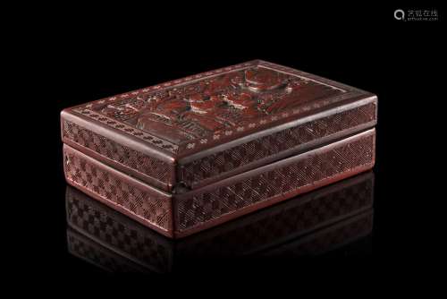 A rectangular cinnabar lacquer and cover carved with a landscape scene and floral motifsChina,
