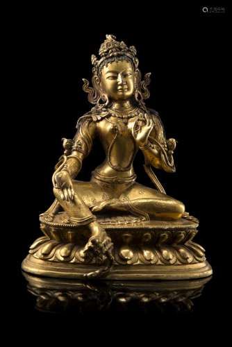 A gilt bronze Tara seated on a double lotus base (losses)Nepal, 18th/19th century(h. 22.5 cm.)ITTara