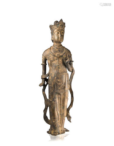 A gilt bronze model of Guanyin, with traces of lacquerChina, Ming dynasty (1368-1644)(h. 52 cm.)