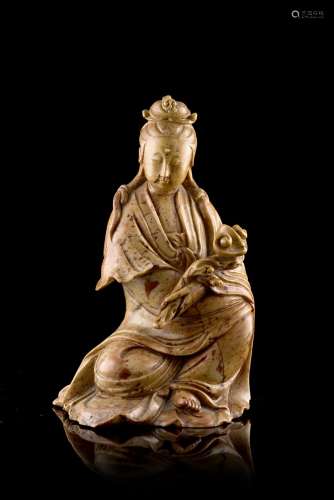 A soapstone model of Guanyin (losses)China, 20th century(h. 14.6 cm.)ITGuanyin in pietra