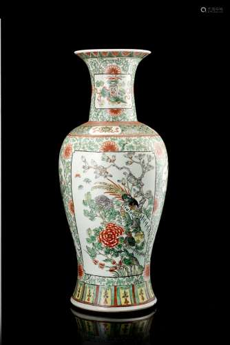 A Famille Rose porcelain vase decorated with birds amongst flowers and geometric motifs (defects)