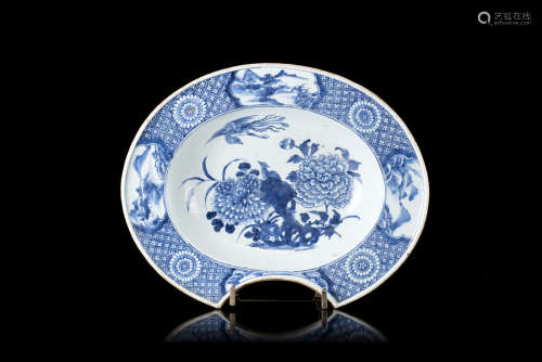 A blue and white porcelain barber's bowl decorated with floral motifs (defects)China, 18th century(