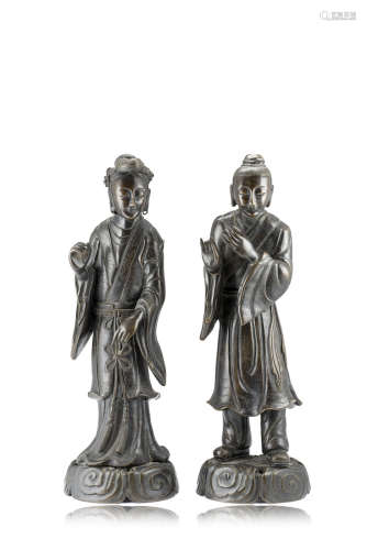 A pair of bronze models of musicians, each standing on a base adorned with cloudsChina, first half