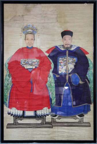 Ancestral portraits. A civil servant and a woman. China.
