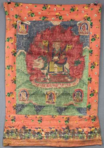 Thangka, China / Tibet old. Lamaistic guardian deity in front of flame aureole.