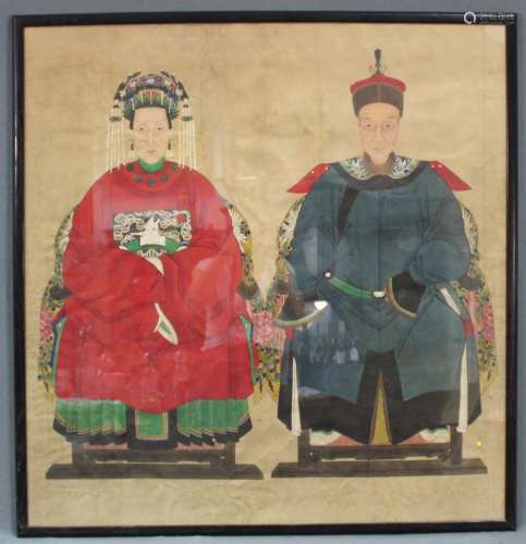 Ancestral portraits. Woman with badge and a man. China.