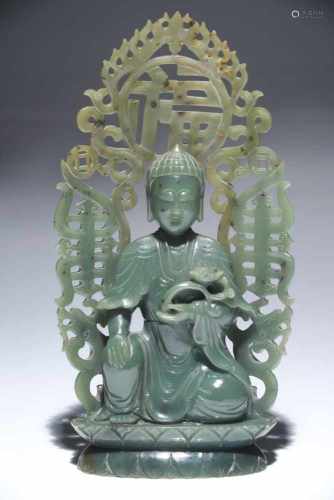 GREEN JADE BUDDHAjade,China, Qing DynastyH: 26,5 cmbuddha on a double lotus,with open work mandorla