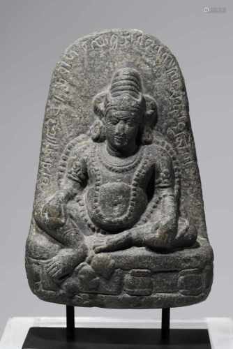 YELLOW JAMBHALAstone,Nepal, 17th centuryH: 20 cmSitting in the vajra position , his left hand