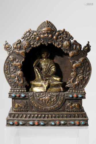 MILAREPA IN SHRINEcopper repousse shrine, with firegilt bronze,Tibet or Mongolia 19th century,H: