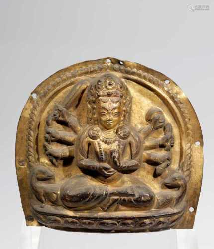 BHAIRABAcopper repousse, fire gilt Nepal, 17th centuryH: 18 cmRare form of a Sitting Bhairaba. Two