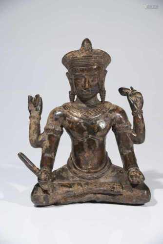 VISHNUbronze,Khmer, 14th centuryH: 22 cmVishnu sitting in lotus position, his four arms holding