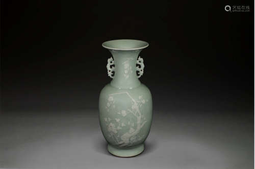 A Celadon and White Slip Vase