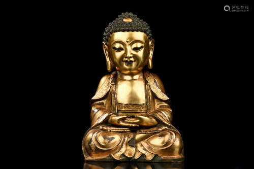 GILT BRONZE CAST 'SHAKYAMUNI' SEATED FIGURE