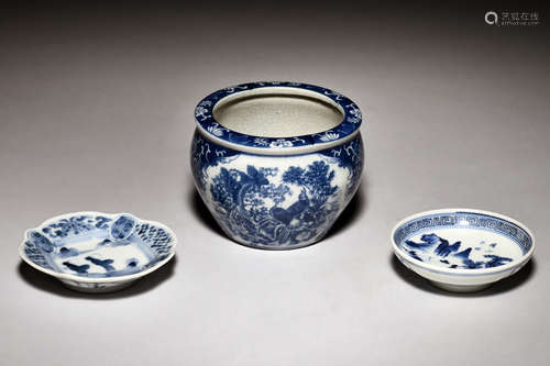 A BLUE AND WHITE JAR AND TWO DISHES