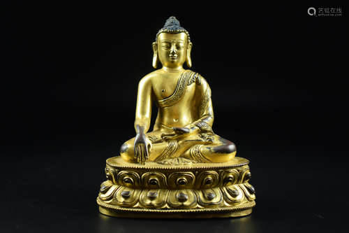 GILT BRONZE CAST SHAKYAMUNI SEATED FIGURE