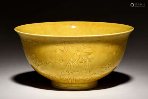 YELLOW GLAZED AND CARVED PORCELAIN BOWL