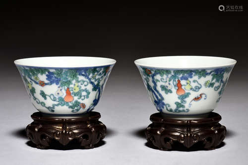 PAIR OF DOUCAI 'GOURD' CUPS WITH WOODEN STANDS