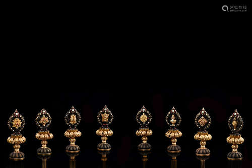 SET OF EIGHT GILT BRONZE CAST 'EIGHT TREASURES' RITUAL ORNAMENTS