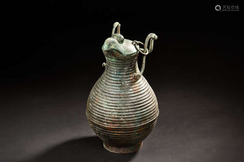 ARCHAIC BRONZE CAST RITUAL VESSEL WITH COVER AND HANDLES