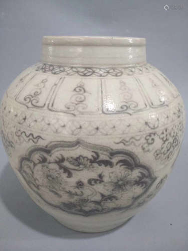 A FLORAL PATTERN UNDERGLAZED RED POT