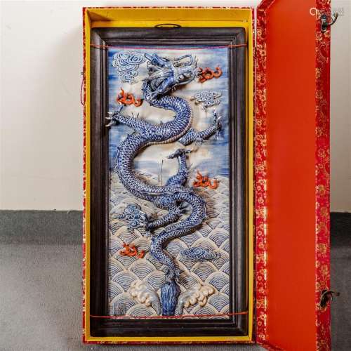 LARGE CHINESE PORCELAIN PLAQUE WITH RELIEF DRAGON - Vertical plaque with a 3-dimensional, 5-toed dragon displayed amidst raised wave...