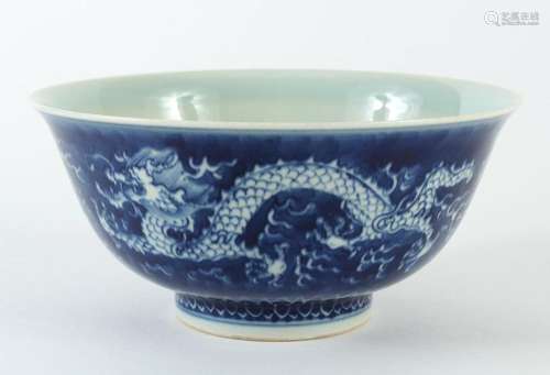 B/W CHINESE PORCELAIN BOWL WITH DRAGONS - Amidst fire symbols, two dragons are shown circling the outer bowl wall chasing the flamin...