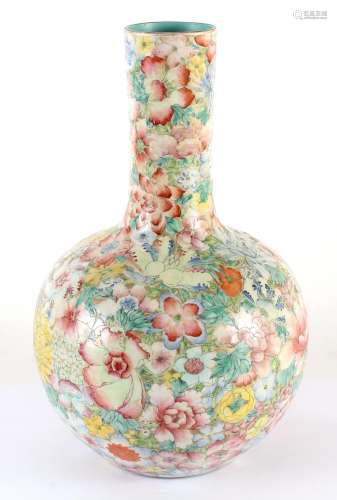 MILLEFLEUR CHINESE PORCELAIN VASE - 19th century. Globular body with an extended tubular neck; decorated in the all-over with a mult...