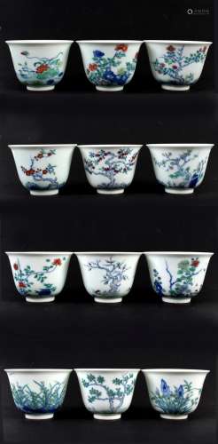 SET OF TWELVE (12) CHINESE PORCELAIN DOUCAI TEA CUPS - Depicting twelve flowers as symbols of the months of the year, with correspon...
