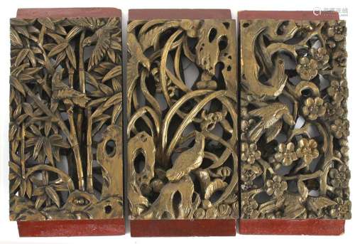 THREE CHINESE CARVED WOOD ARCHITECTURAL FRAGMENTS - Rectangular shape with 3-dimensional carved scenes of songbirds, prunus, bamboo ...