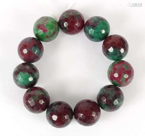 BRACELET OF FACETED HARDSTONE BEADS - These 11 mottled purple and green 3/4