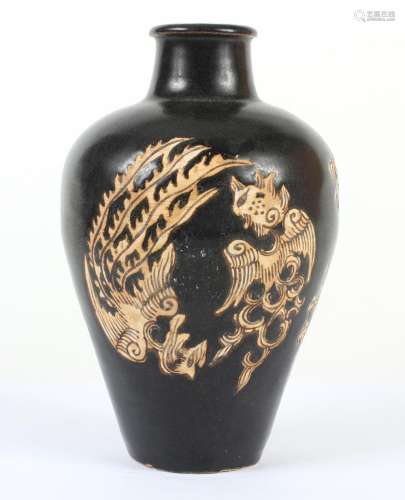 CHINESE PORCELAIN GALLIPOT SHAPED VASE -Having a dark brown/black ground with stylized phoenix inscribed/carved in light tan.