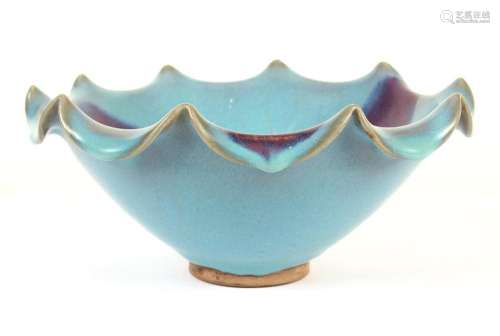 CHINESE PORCELAIN FLAMBE BOWL - Having a sharply ruffled edge; three splashes of fuschia glaze