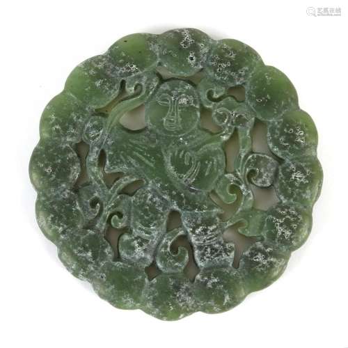 SPINACH GREEN JADE BLESSING PLAQUE C.1940 - Round, with a flat-carved human figure at center of the reticulated disc. The surface is...