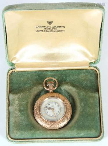 ANTIQUE LADY'S POCKET WATCH - Features a beautiful enameled dial with Arabic numerals, gold leaf, and gold hands. Yellow gold-filled..
