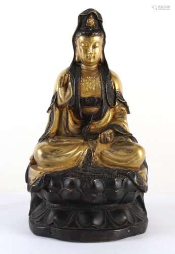 CHINESE GILT BRONZE FIGURE OF QUAN YIN - Seated in the full lotus position on a double lotus throne. Her right hand