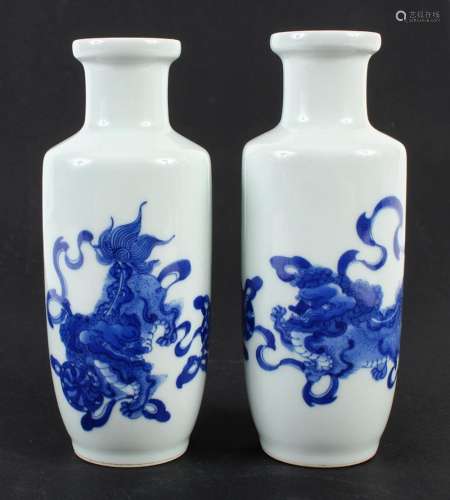 PAIR SMALL B/W CHINESE PORCELAIN VASES - Slender bottle shape decorated with images of Fu Lions and Buddhist symbols. Character mark...